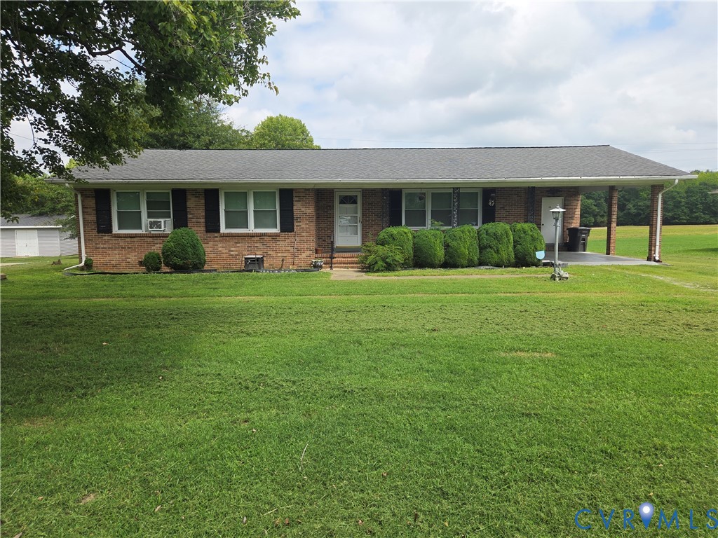 238 Purdy Road Emporia, VA 23847 - Photo 1 of 7 Brick ranch home featuring a covered front porch a