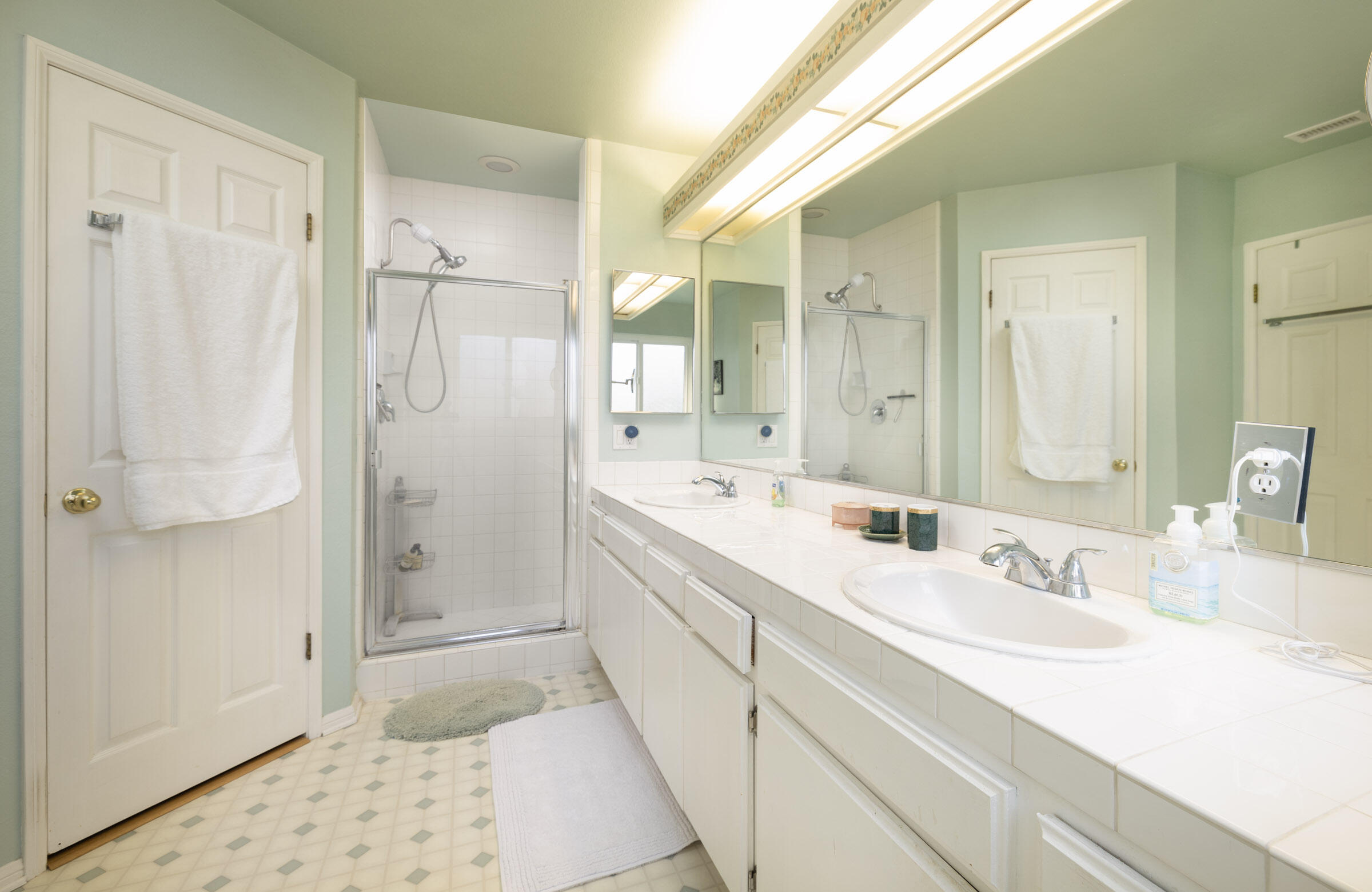 1539 Meadow Circle Carpinteria, CA 93013 - Photo 16 of 21 a bathroom with a sink and a mirror
