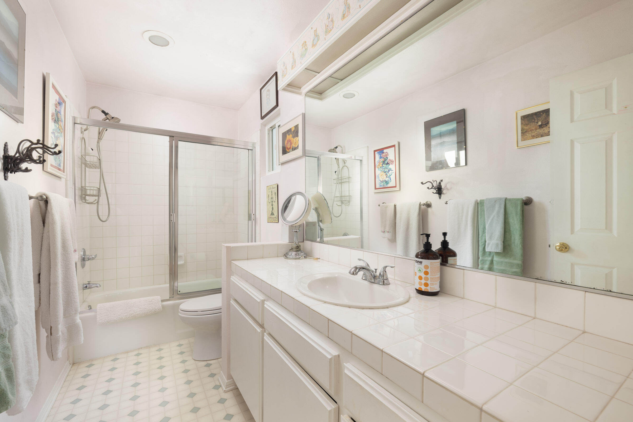 1539 Meadow Circle Carpinteria, CA 93013 - Photo 20 of 21 a bathroom with a sink a toilet and shower
