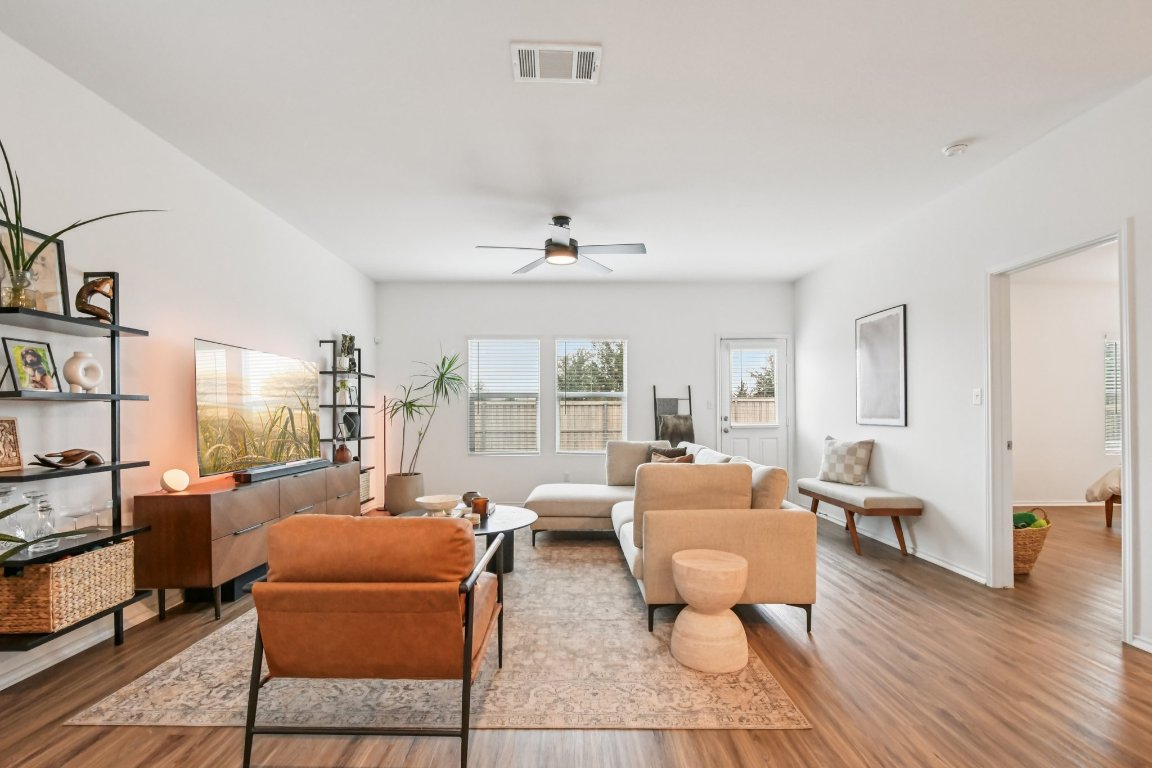 117 Badillo Way Bastrop, TX 78602 - Photo 11 of 40 a living room with furniture and a large window