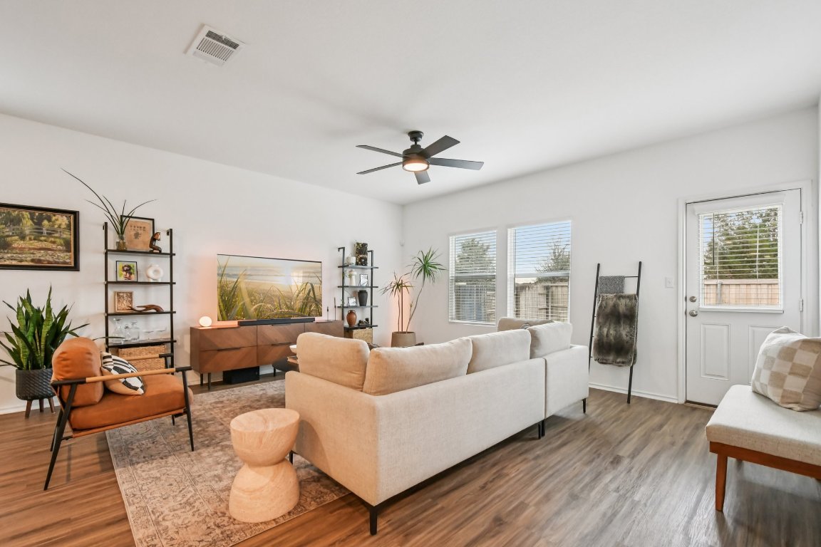 117 Badillo Way Bastrop, TX 78602 - Photo 12 of 40 a living room with furniture and a large window