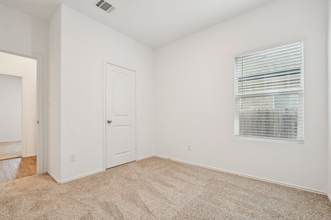 117 Badillo Way Bastrop, TX 78602 - Photo 31 of 40 a view of an empty room with a window