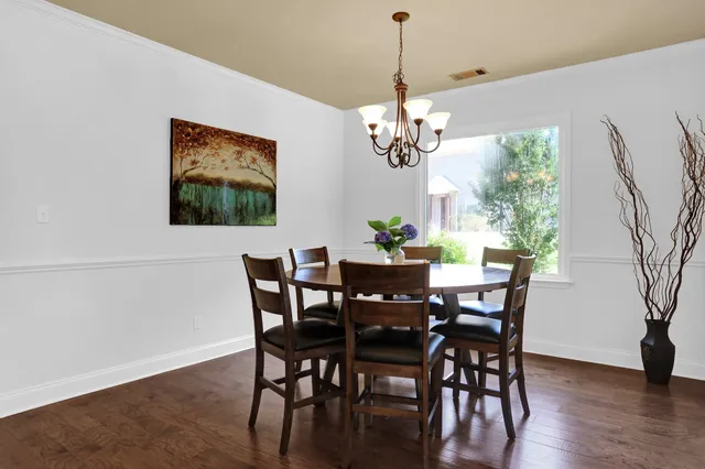 a kitchen with a sink cabinets and window