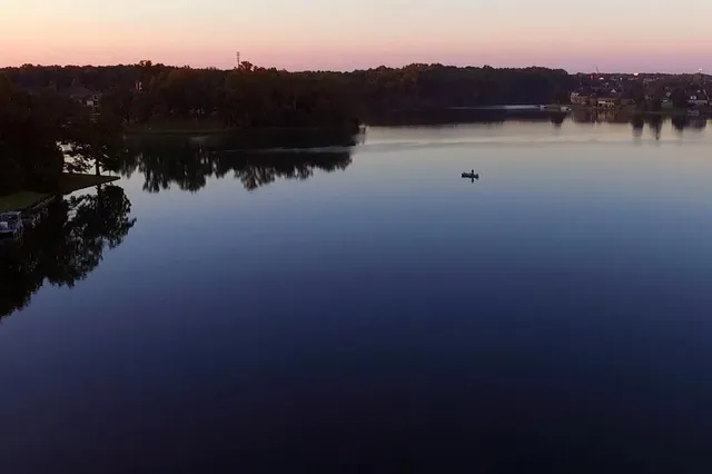 a view of lake with mountain