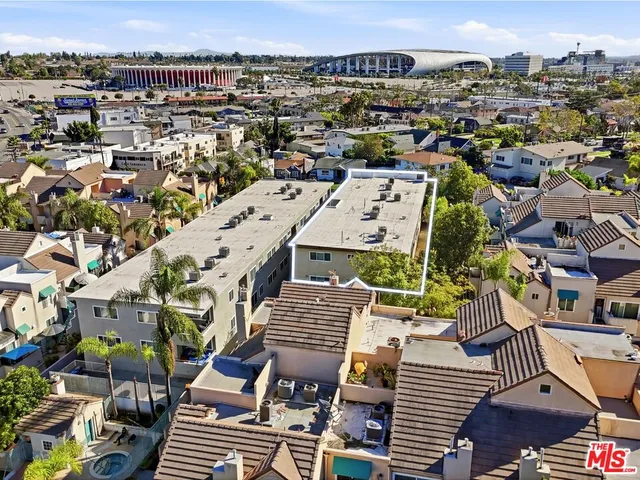 a view of a building with a yard