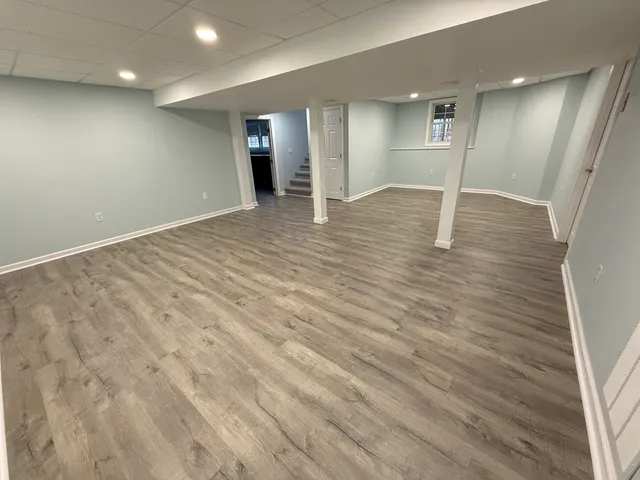 a outdoor space with lots of white furniture