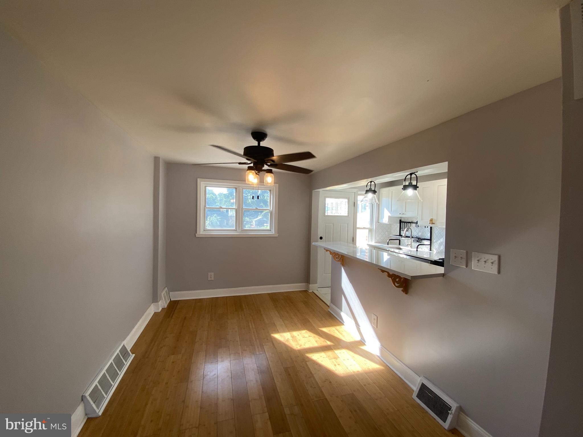 365 Ripka Street Philadelphia, PA 19128 - Photo 4 of 10 a view of empty room with wooden floor and fan