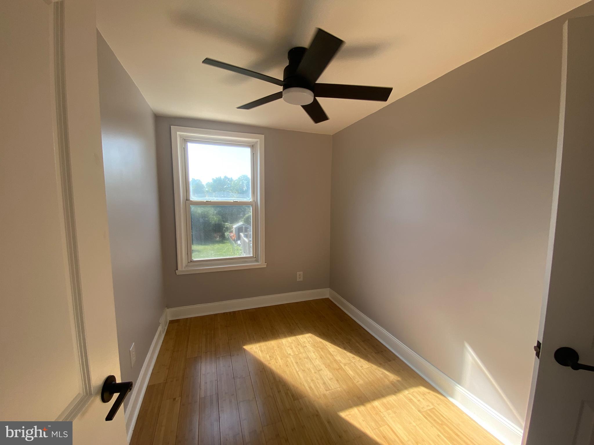 365 Ripka Street Philadelphia, PA 19128 - Photo 9 of 10 a view of empty room with wooden floor and fan