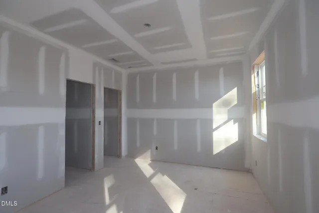 an empty room with windows