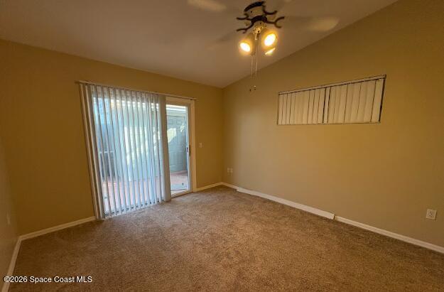 1927 Quail Ridge Court, Unit 1404 Cocoa, FL 32926 - Photo 13 of 23 an empty room with windows and entrance