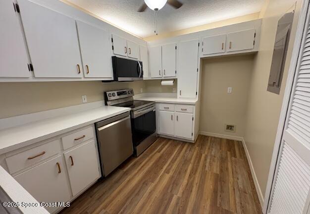 1927 Quail Ridge Court, Unit 1404 Cocoa, FL 32926 - Photo 18 of 23 a kitchen with cabinets appliances and a window