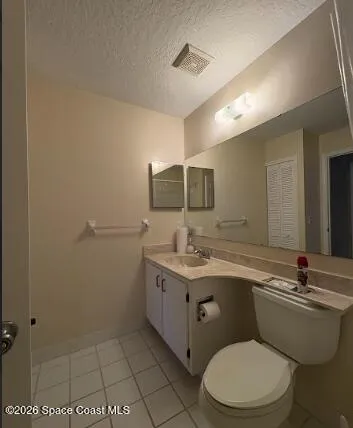 a kitchen with cabinets and appliances
