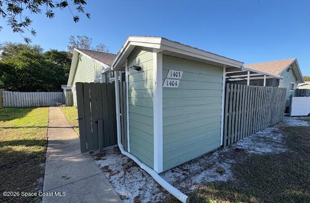 1927 Quail Ridge Court, Unit 1404 Cocoa, FL 32926 - Photo 2 of 23 a view of a house with backyard and sitting area