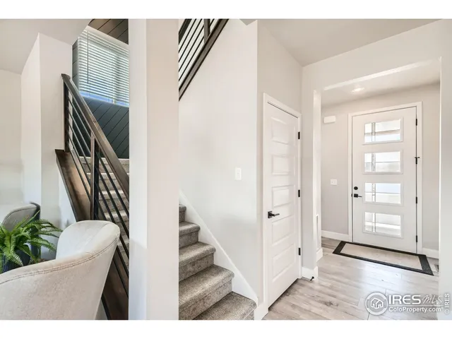 a view of an entryway with staircase