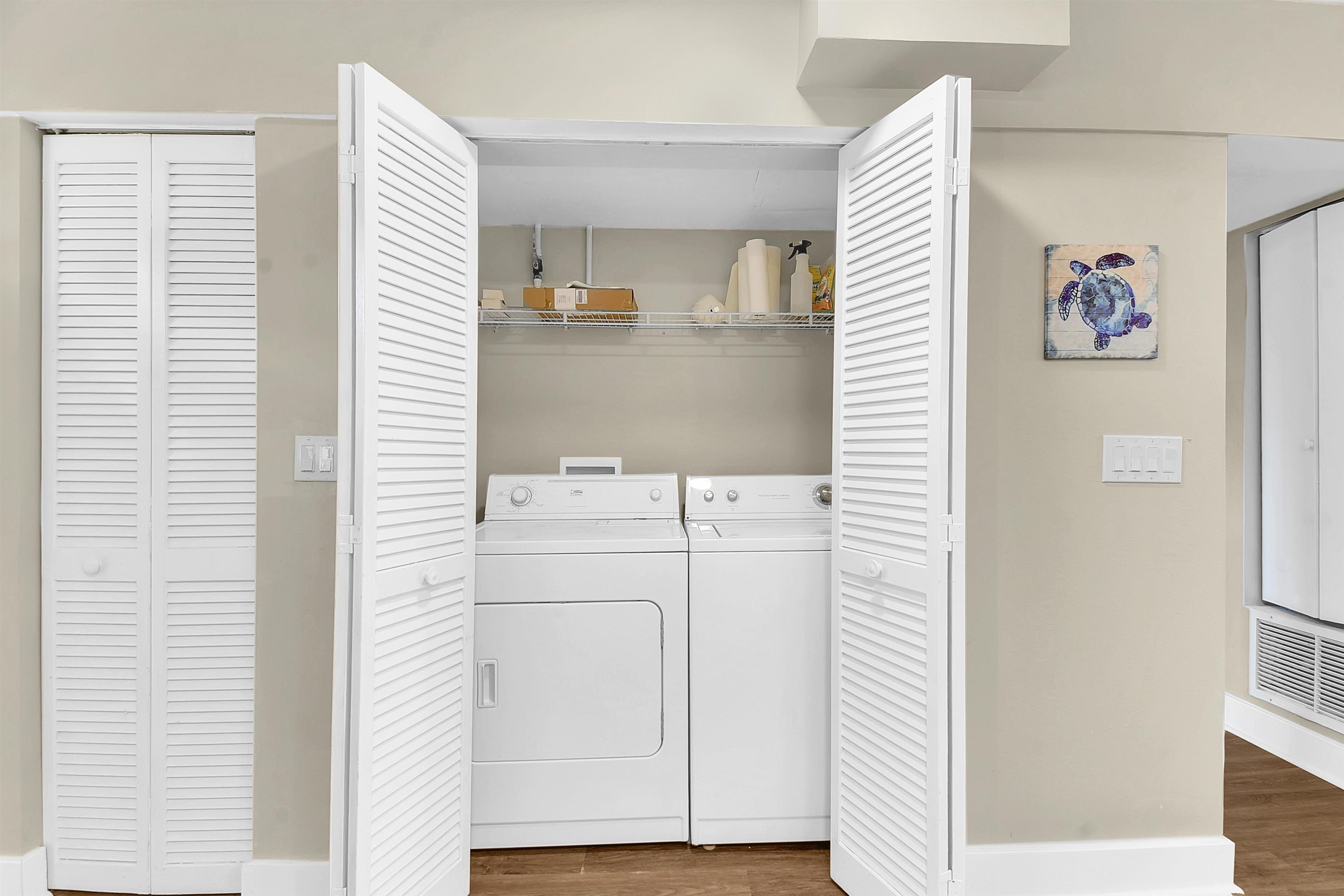 4 Ocean Trace Road, Unit 106 St. Augustine, FL 32080 - Photo 13 of 18 a bathroom with a sink and a mirror