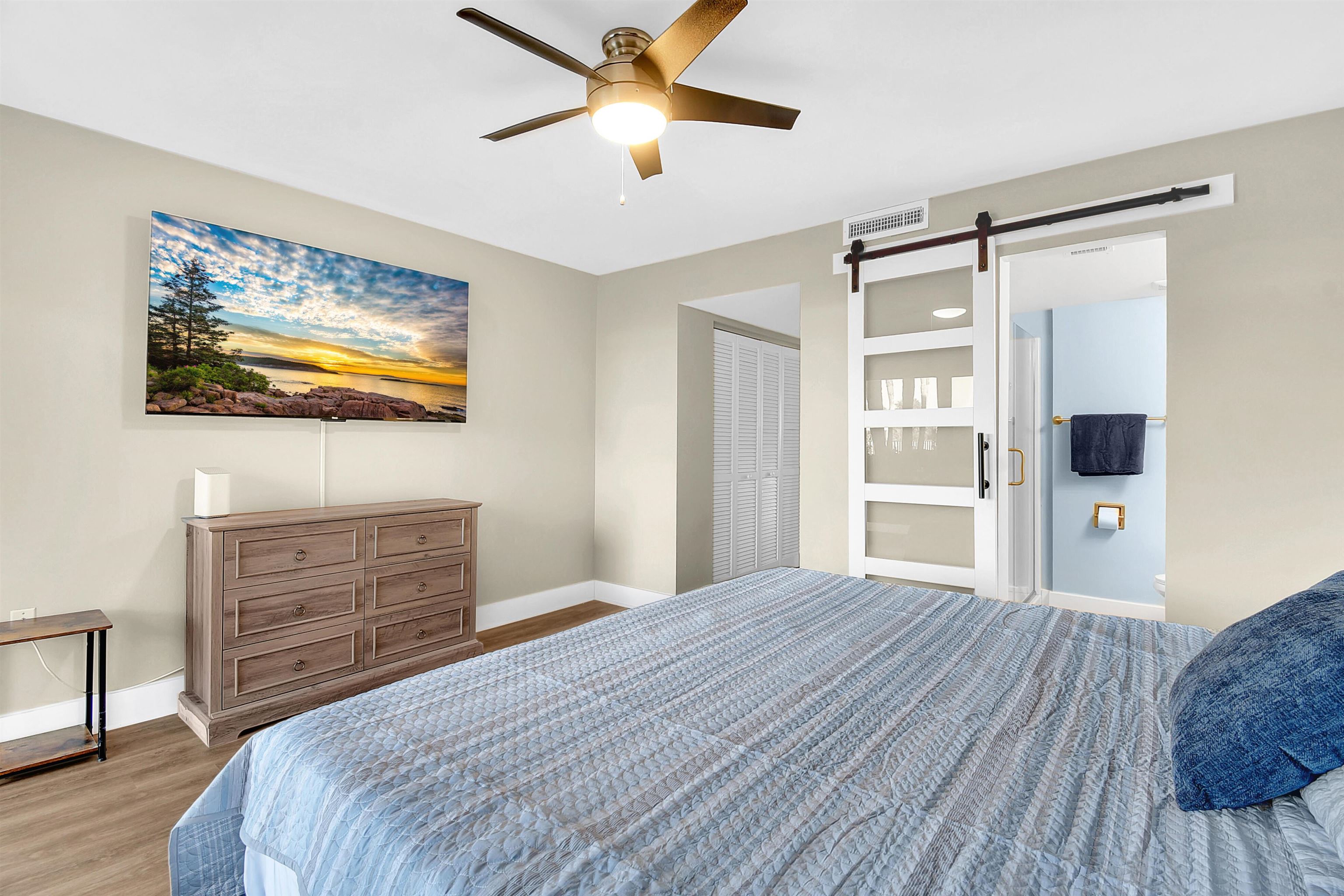 4 Ocean Trace Road, Unit 106 St. Augustine, FL 32080 - Photo 2 of 18 a bedroom with a bed and a dresser