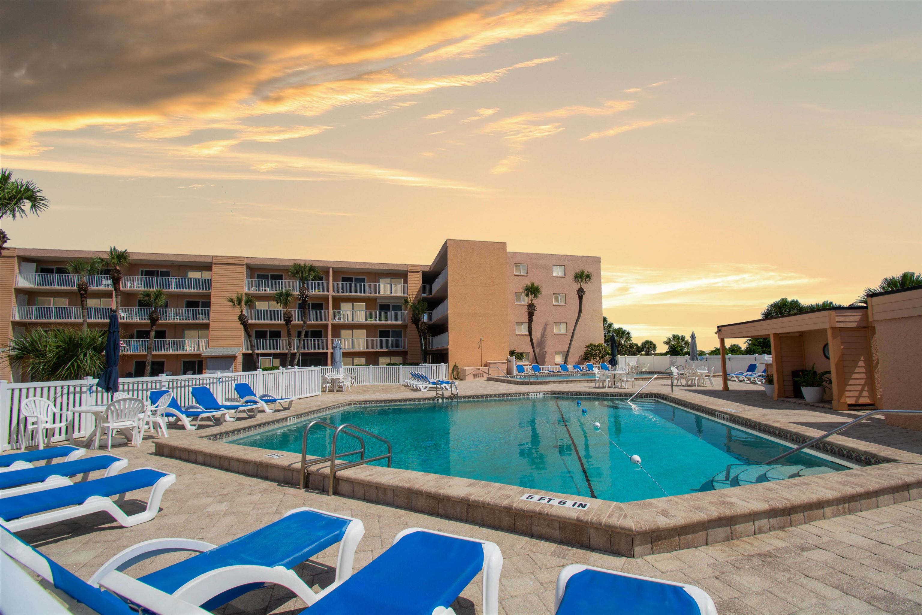 4 Ocean Trace Road, Unit 106 St. Augustine, FL 32080 - Photo 7 of 18 a view of swimming pool from a lounge chairs