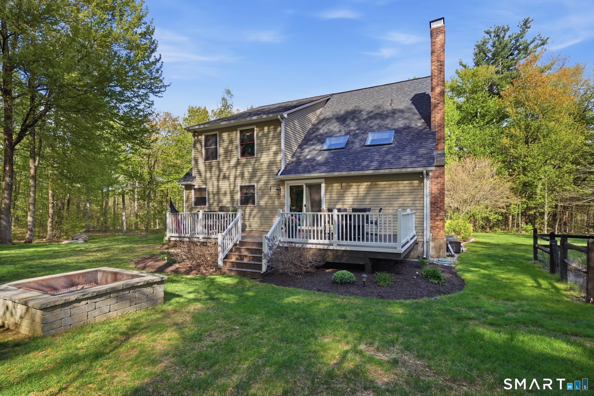 174 Walnut Hill Road Hartland, CT 06027 - Photo 34 of 36 a view of a house with a backyard and a patio