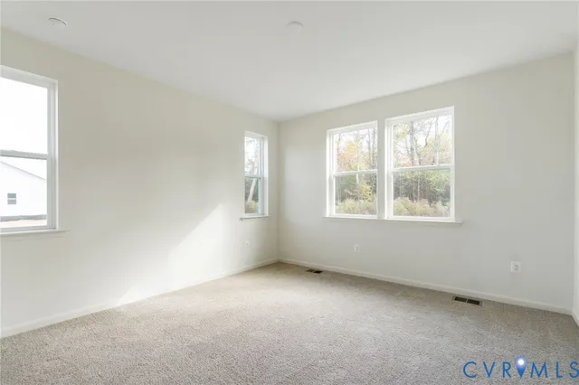 an empty room with windows