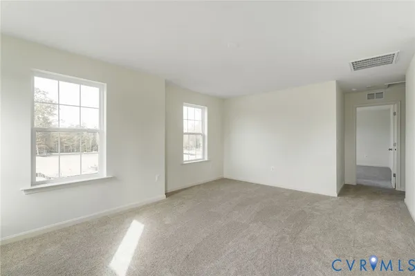 an empty room with windows