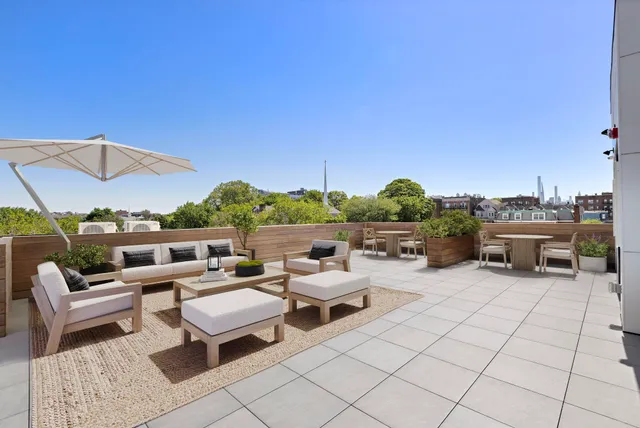 a terrace view with sitting space