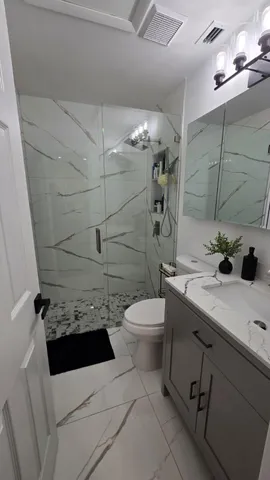 a view of a chairs in backyard of house