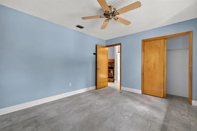 a view of swimming pool with outdoor seating