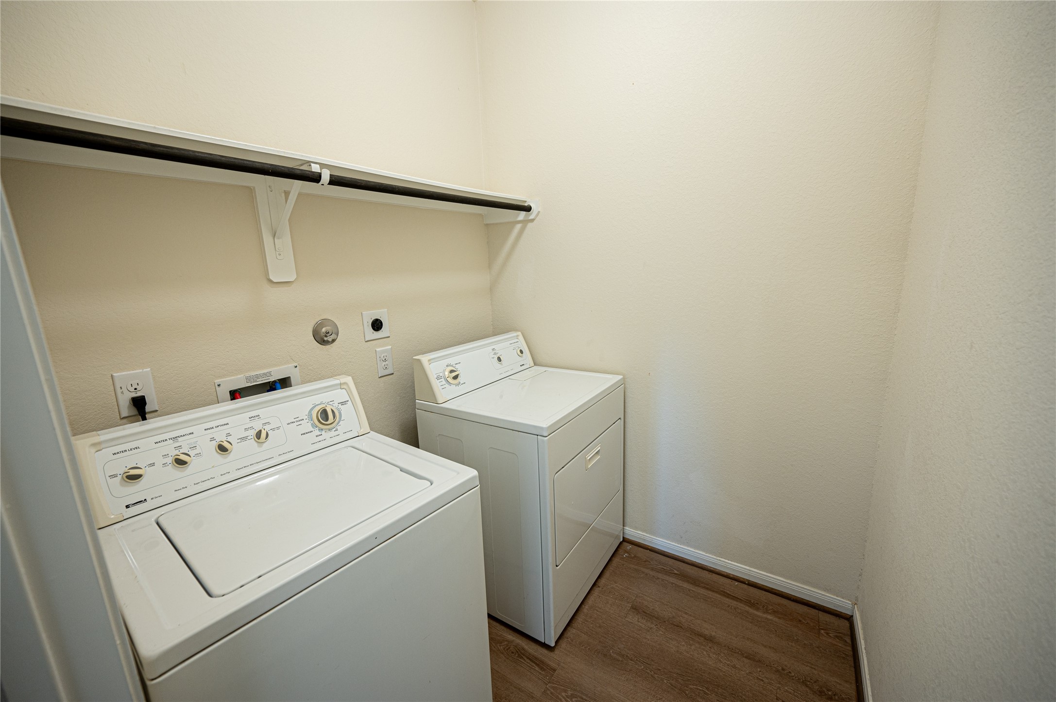 10730 Nathaniel Valley Path Houston, TX 77016 - Photo 16 of 38 a utility room with dryer and washer