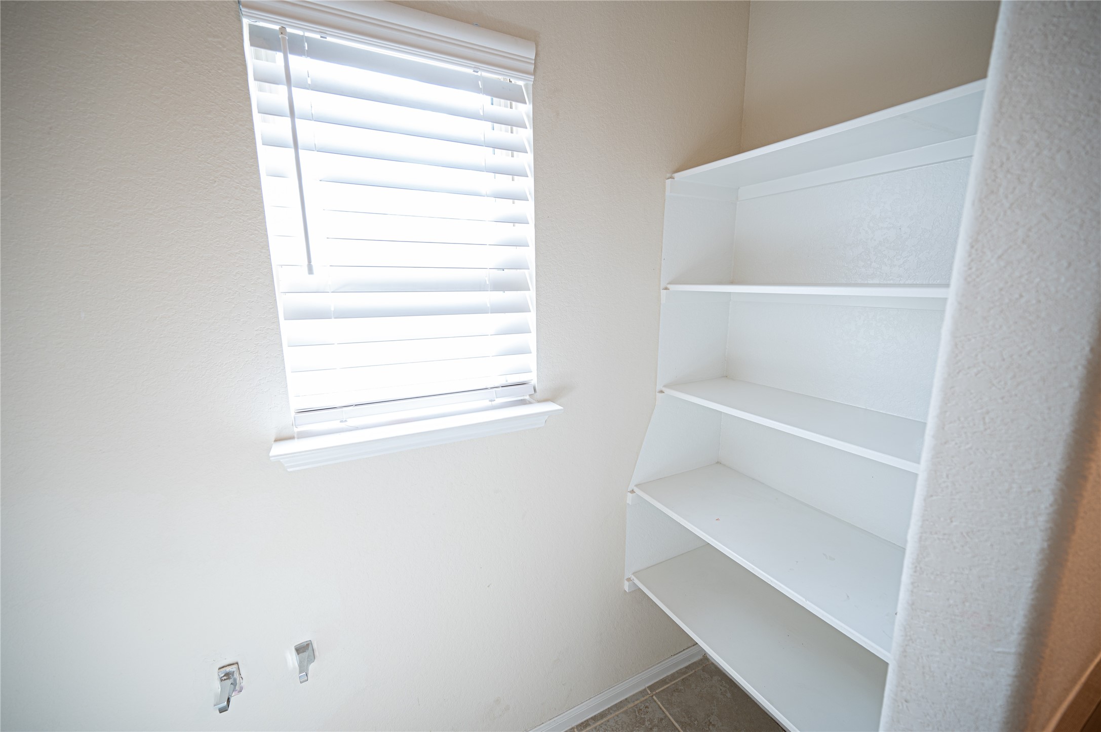 10730 Nathaniel Valley Path Houston, TX 77016 - Photo 30 of 38 a view of an empty room with a window