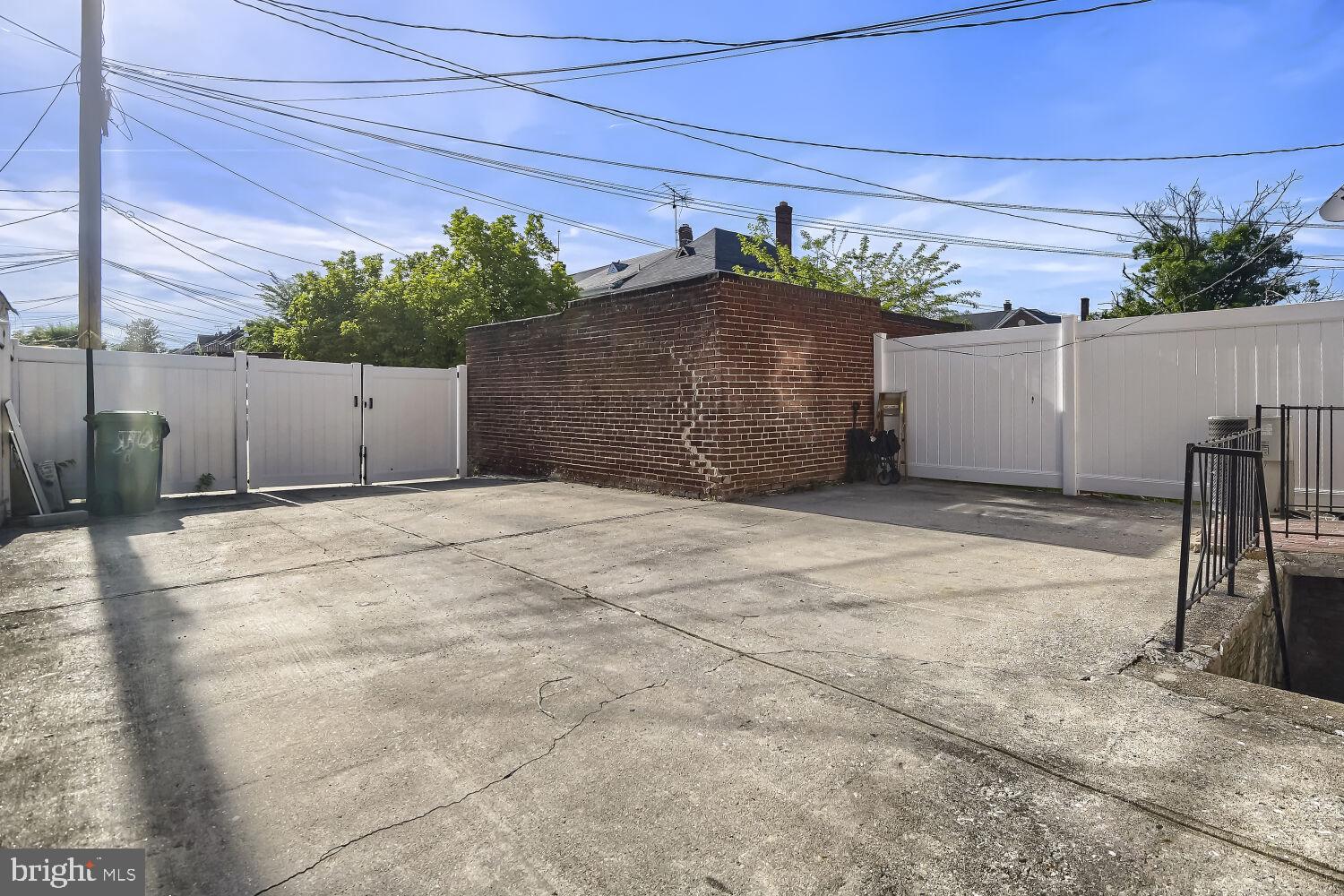 4012 Hillen Road Baltimore, MD 21218 - Photo 13 of 14 Spacious outdoor area with parking.