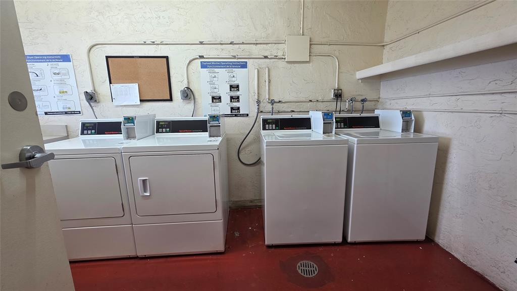 253 South Cypress Road, Unit 225 Pompano Beach, FL 33060 - Photo 17 of 23 a utility room with dryer and washer
