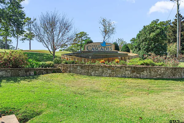 a swimming pool with outdoor seating and yard
