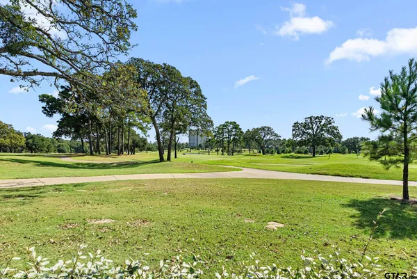 a view of an outdoor space with swimming pool
