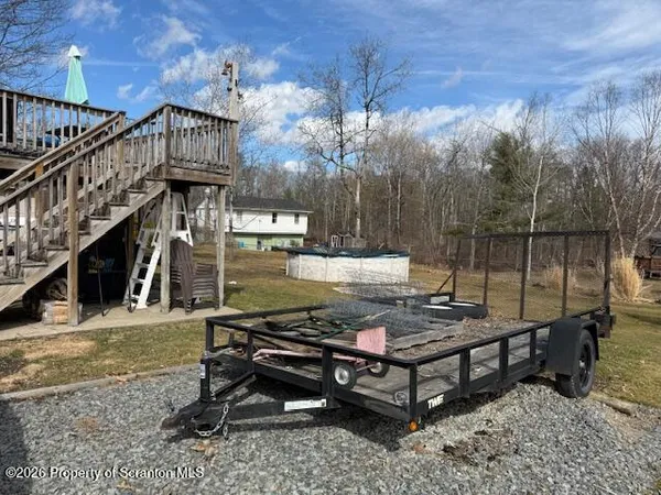 a view of a chairs and tables in the patio