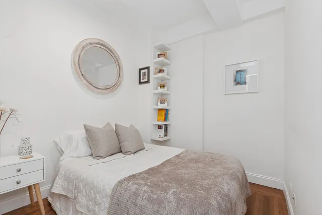 a picture of a book and a bed