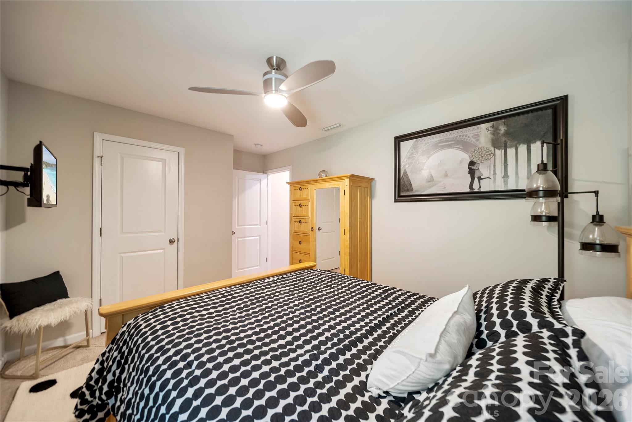 8122 Mossy Rock Road Waxhaw, NC 28173 - Photo 22 of 28 a bedroom with a bed and a view of bathroom