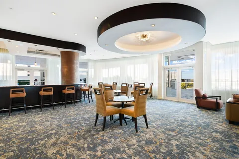 a kitchen with stainless steel appliances granite countertop a sink and stove
