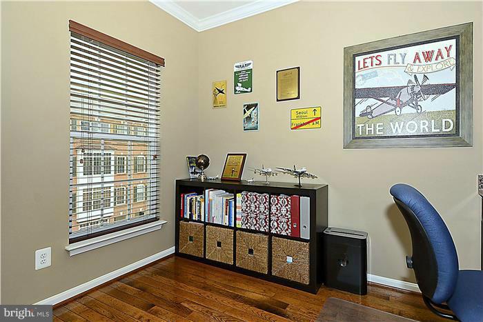 22751 Verde Gate Terrace Ashburn, VA 20148 - Photo 20 of 29 a view of a workspace with furniture and window