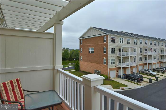 22751 Verde Gate Terrace Ashburn, VA 20148 - Photo 21 of 29 a view of a balcony with chairs