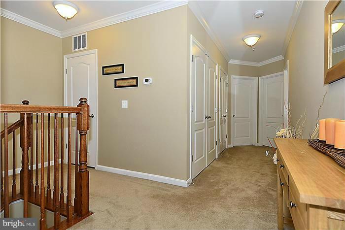 22751 Verde Gate Terrace Ashburn, VA 20148 - Photo 25 of 29 a view of a hallway to a bedroom