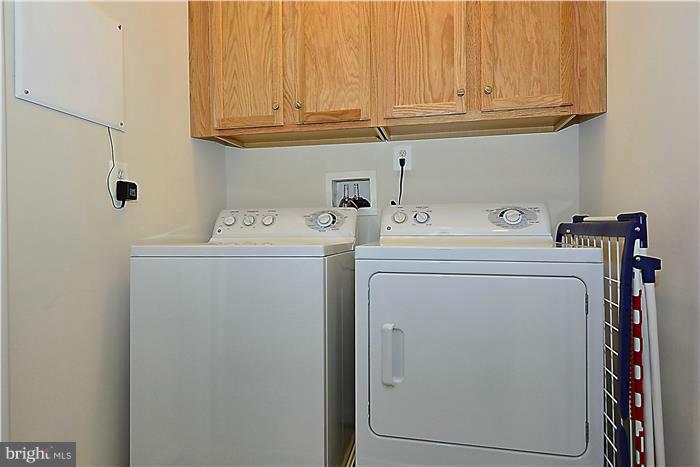 22751 Verde Gate Terrace Ashburn, VA 20148 - Photo 28 of 29 a utility room with dryer and washer