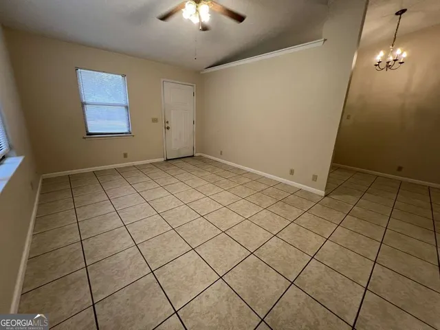 an empty room with windows