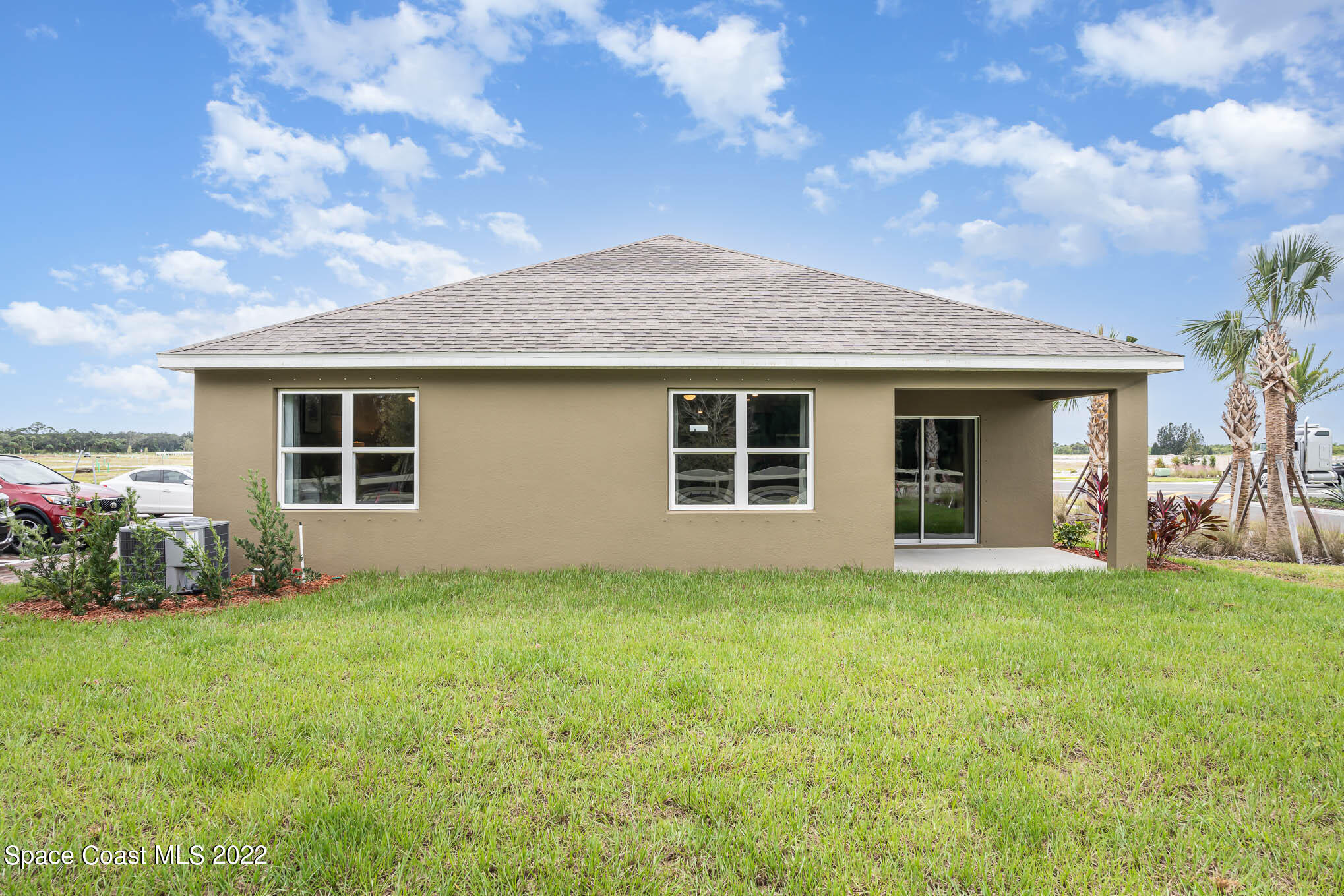 1058 Trinity Street Rockledge, FL 32955 - Photo 21 of 30 front view of a house with a yard