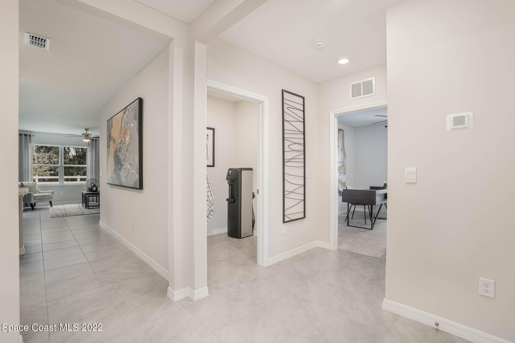 1058 Trinity Street Rockledge, FL 32955 - Photo 6 of 30 a view of a livingroom with furniture and closet