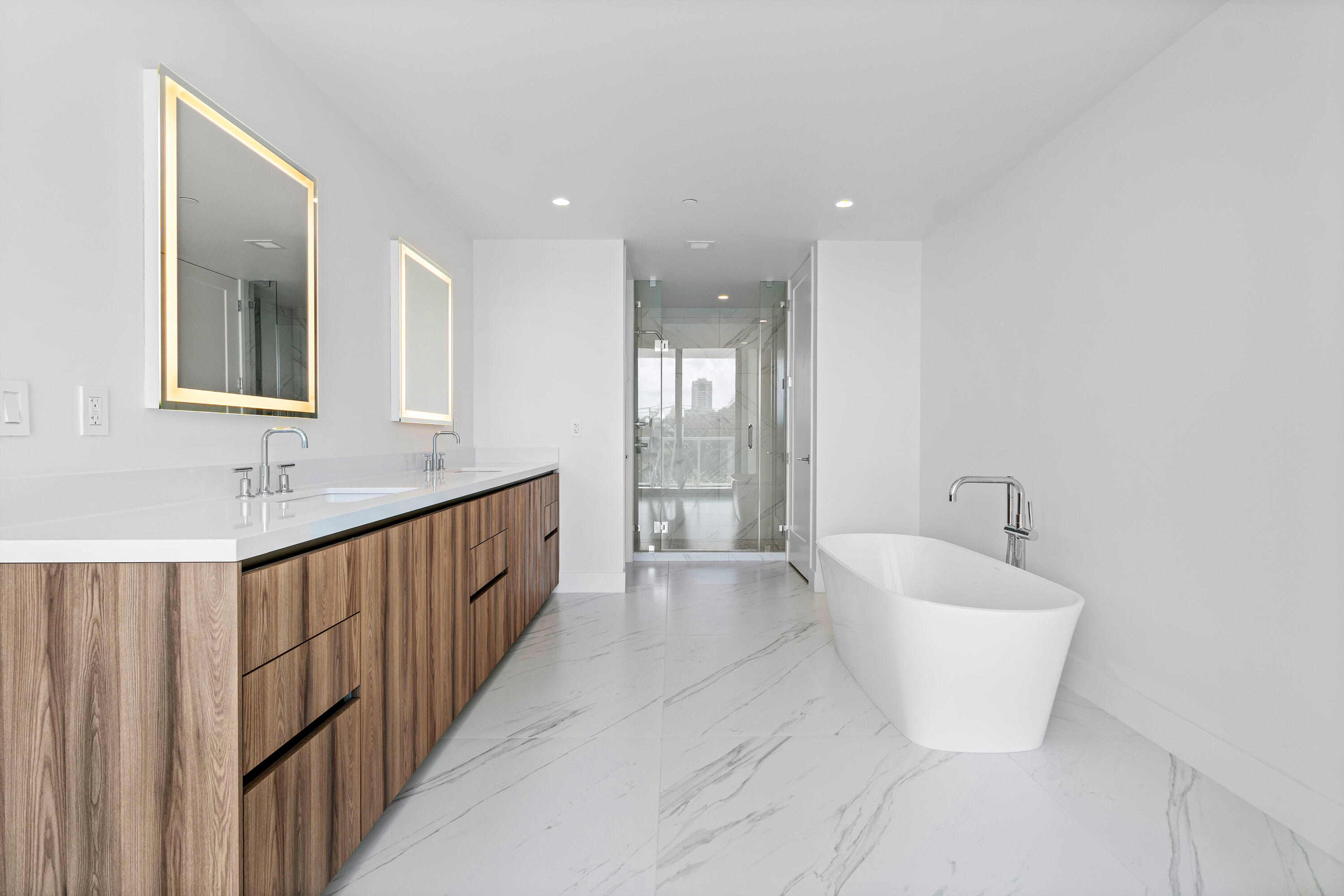 495 East Royal Palm Road, Unit 402 Boca Raton, FL 33432 - Photo 21 of 63 a bathroom with a sink and a bathtub