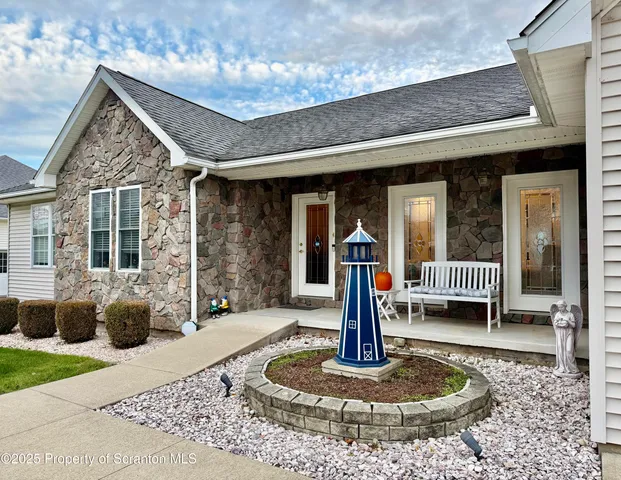 a front view of a house with a porch
