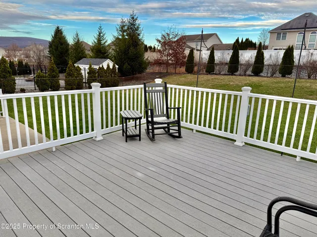 a view of a roof deck with couches