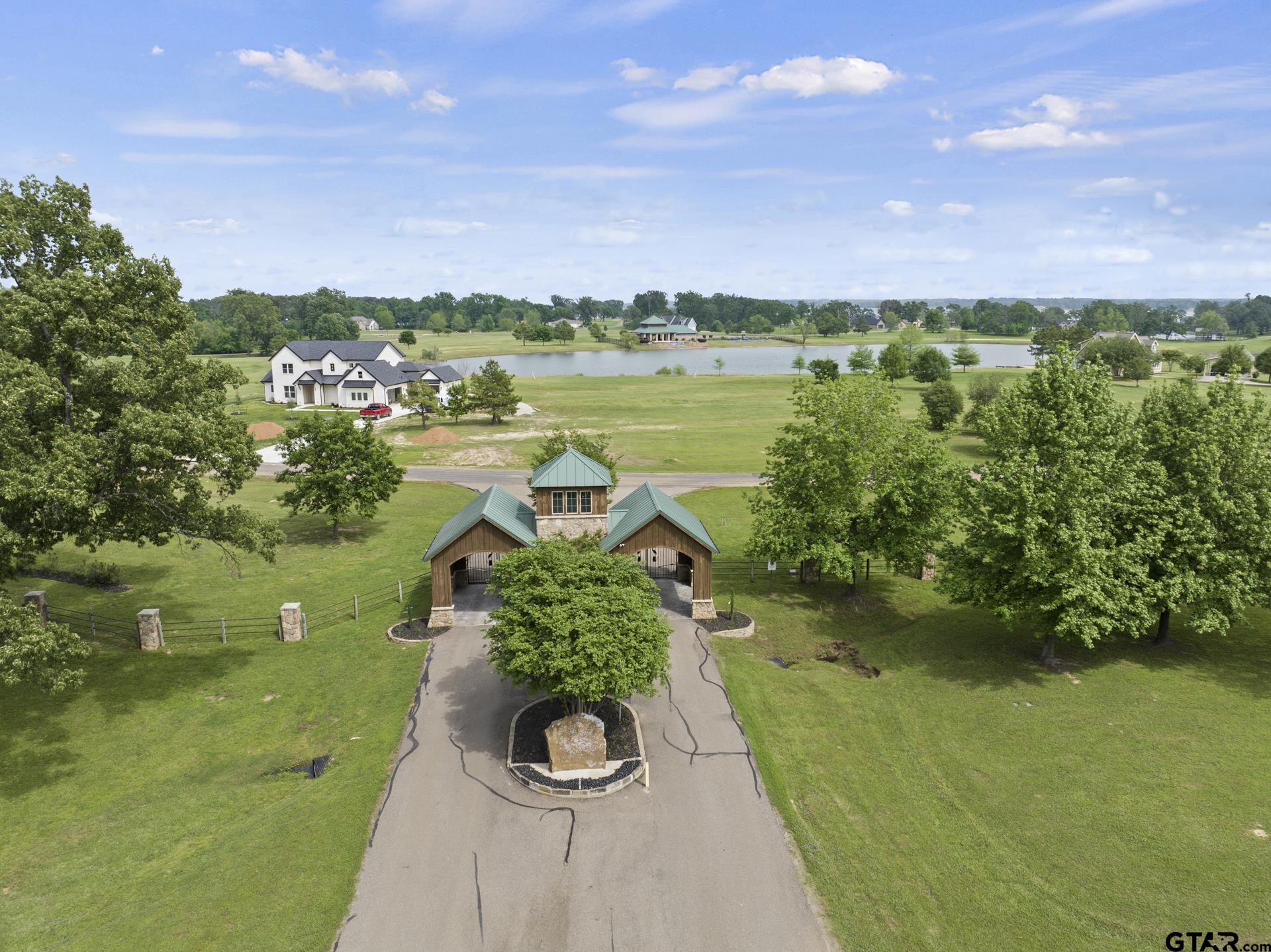 232 PR 2712 Mount Pleasant, TX 75455 - Photo 11 of 22 a view of a lake with a yard