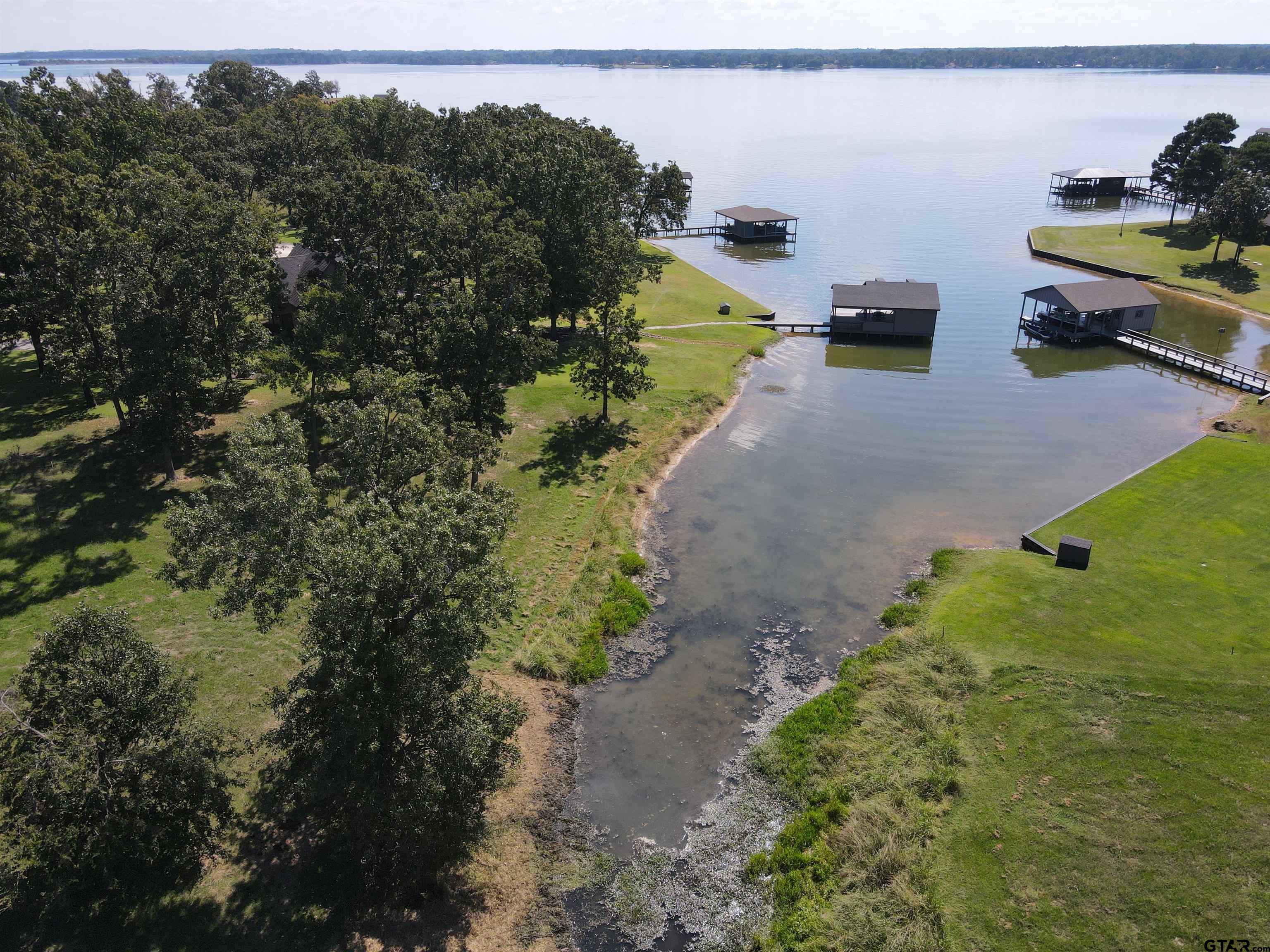 232 PR 2712 Mount Pleasant, TX 75455 - Photo 20 of 22 a view of a yard with table and chairs