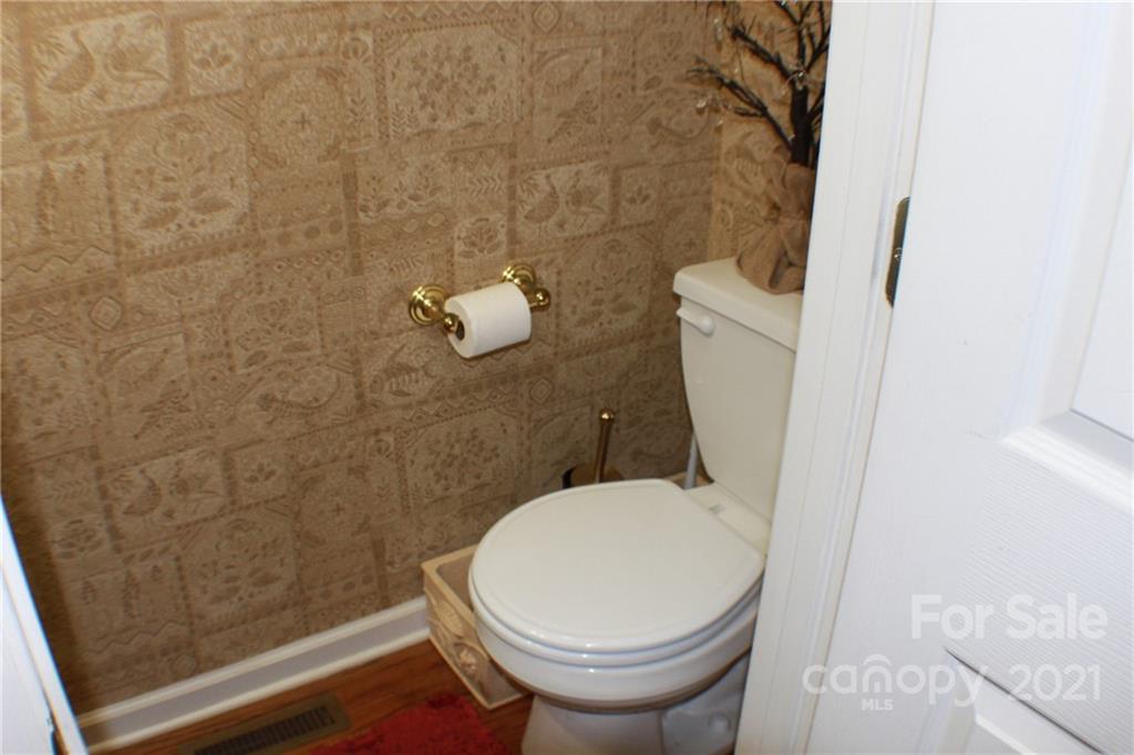 128 Cameron Drive Rutherfordton, NC 28139 - Photo 15 of 48 a bathroom with a toilet and a shower